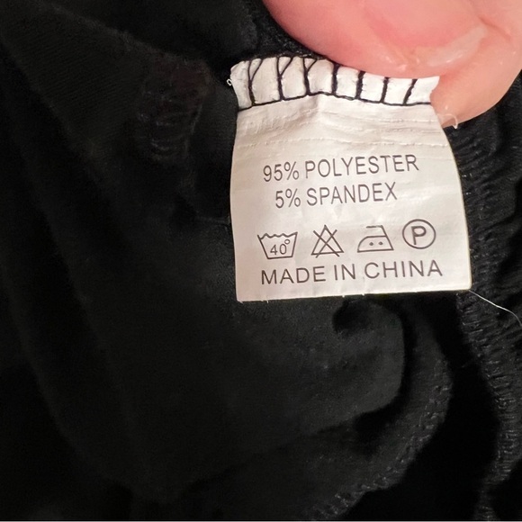 Black Sleeveless Button Front Ruffled Hem Sundress - Picture 9 of 12